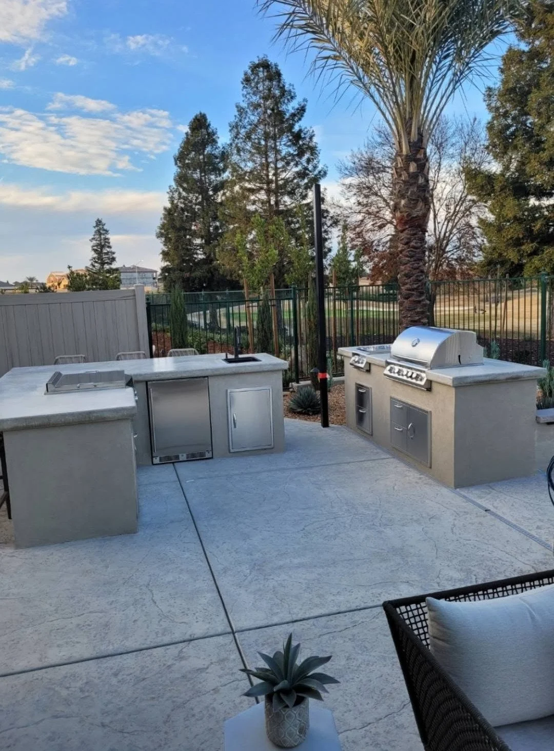 Two-grill outdoor kitchen island built in-house by Specialty Landscape