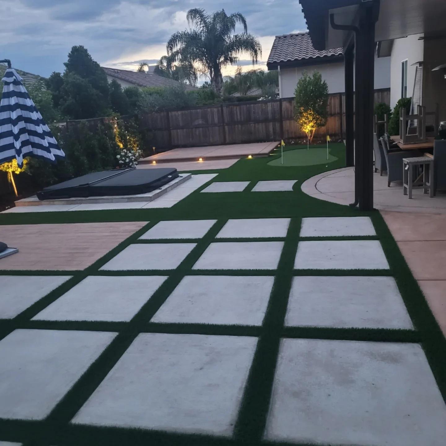 Paver and turf checkerboard walkway built by Specialty Landscape in Kerman