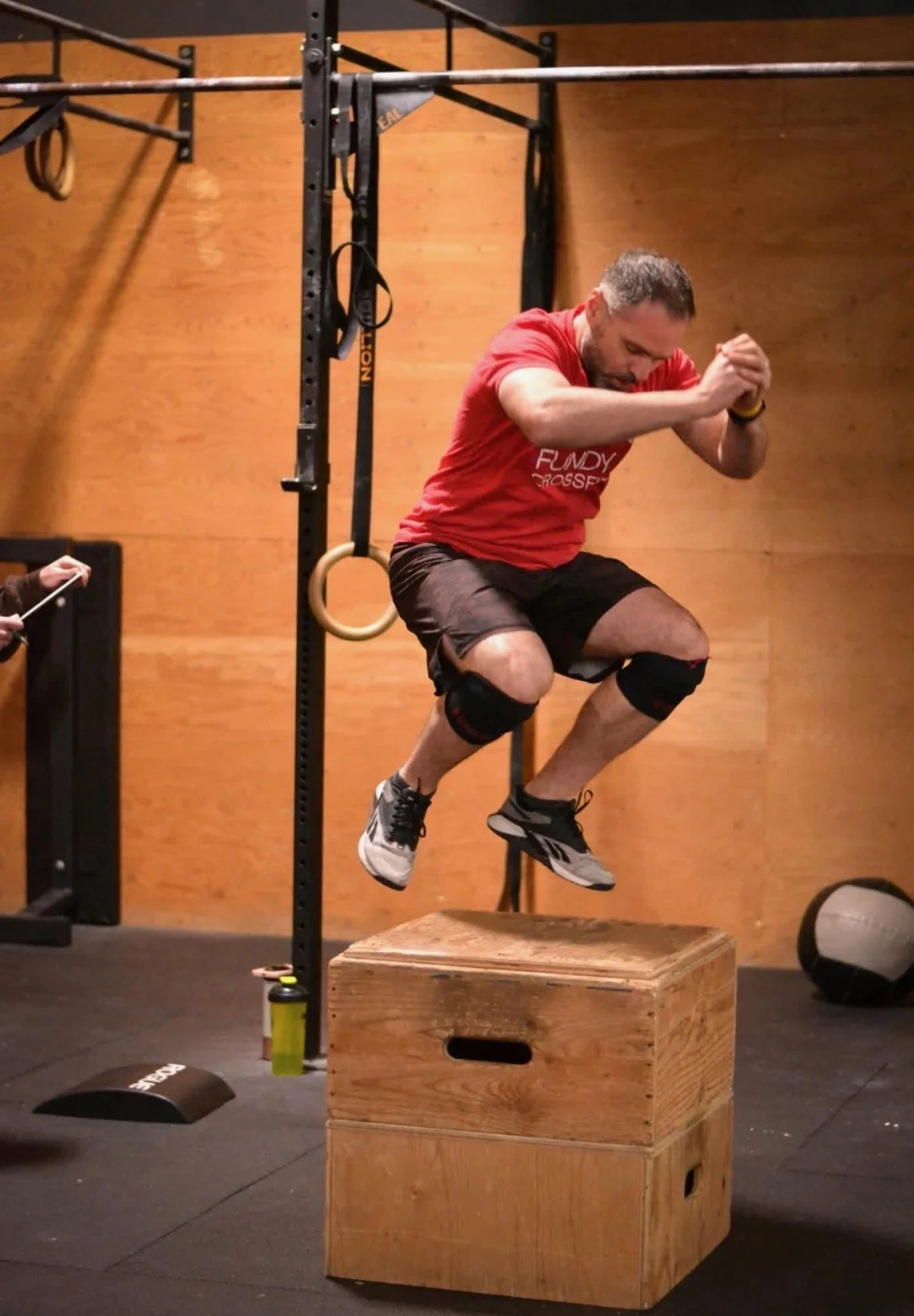 Fundy CrossFit member doing a box jump