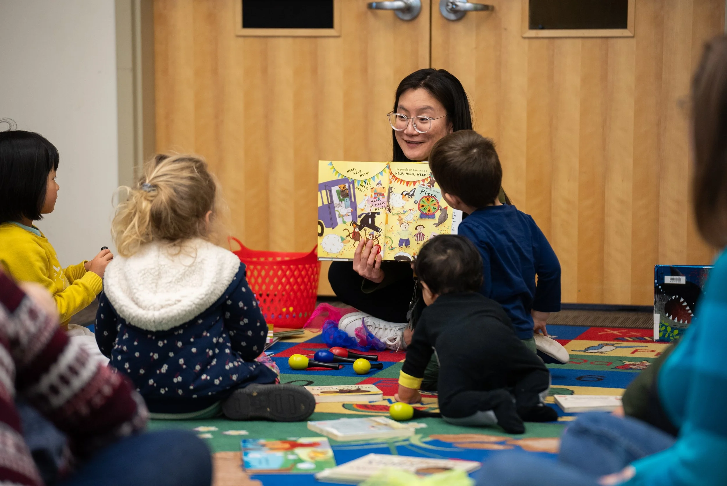 Child participating in a library learning program