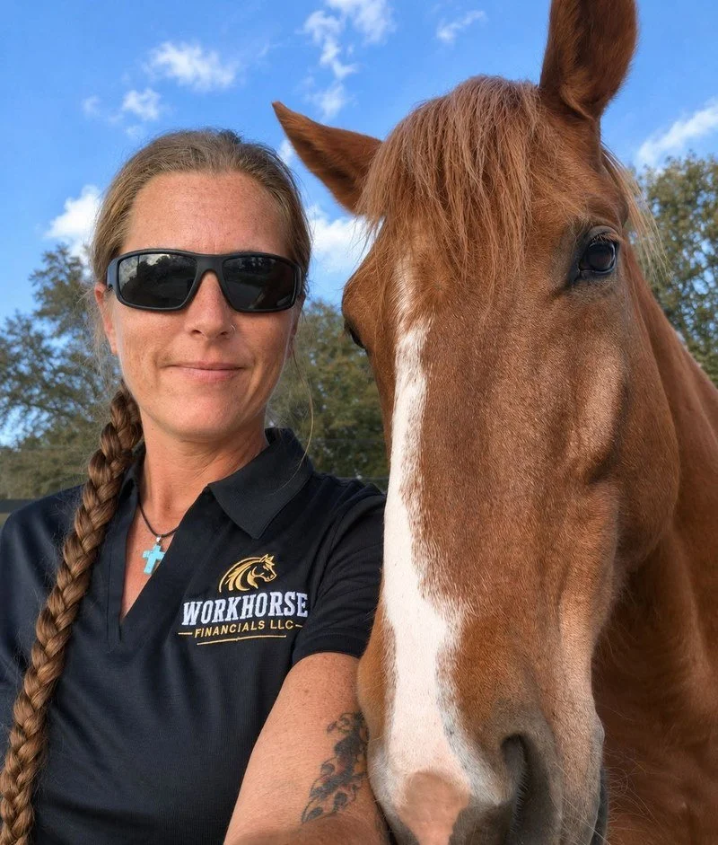 Jaclyn, owner of Workhorse Financials, with one of the horses at Longstreet Farms