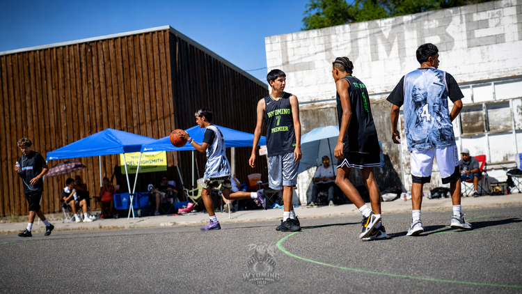 Wyoming Premier Hoops players moving through game action
