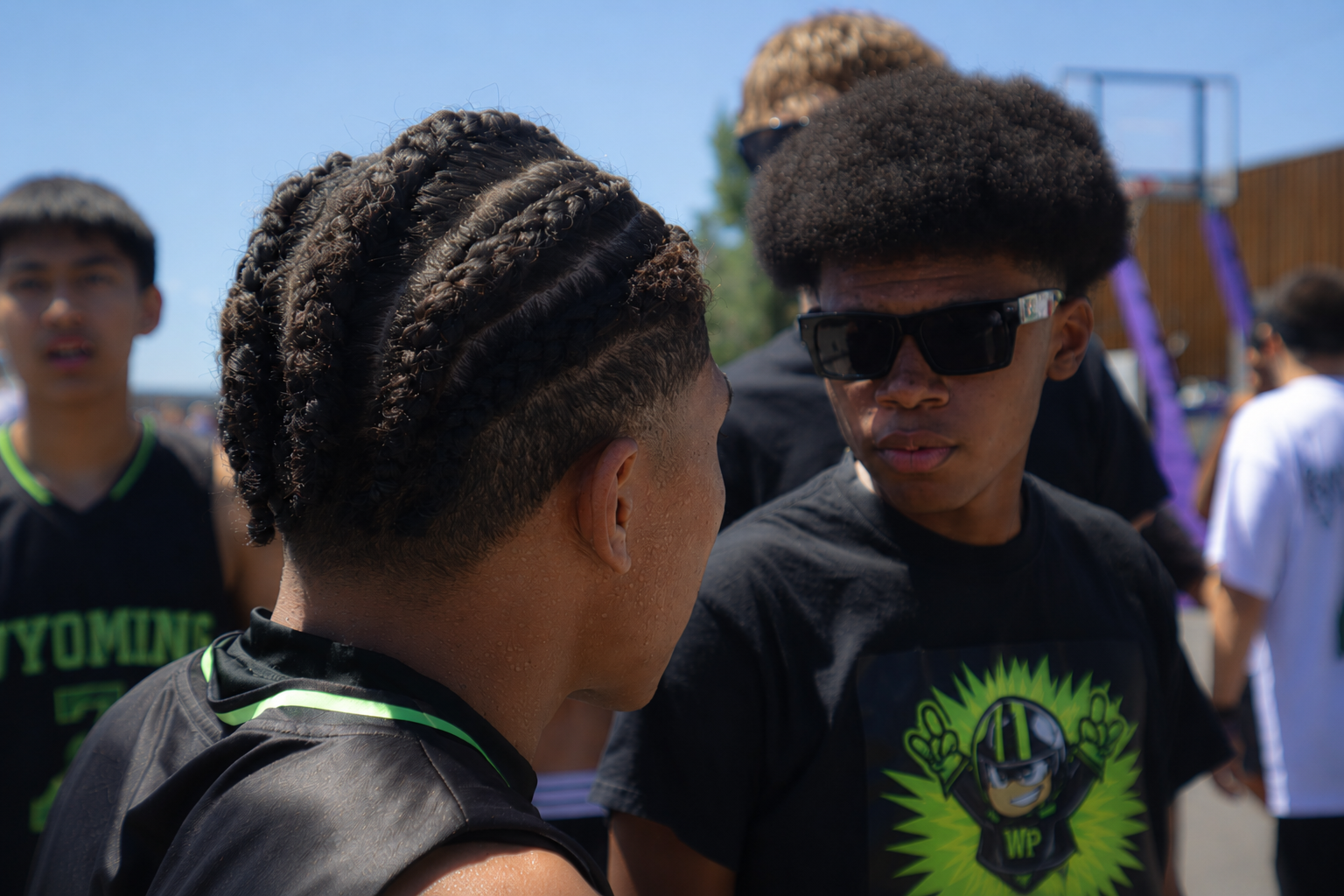 Wyoming Premier Hoops players talking between games