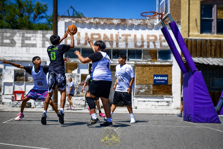 Wyoming Premier Hoops 16U Gold player shooting near the basket