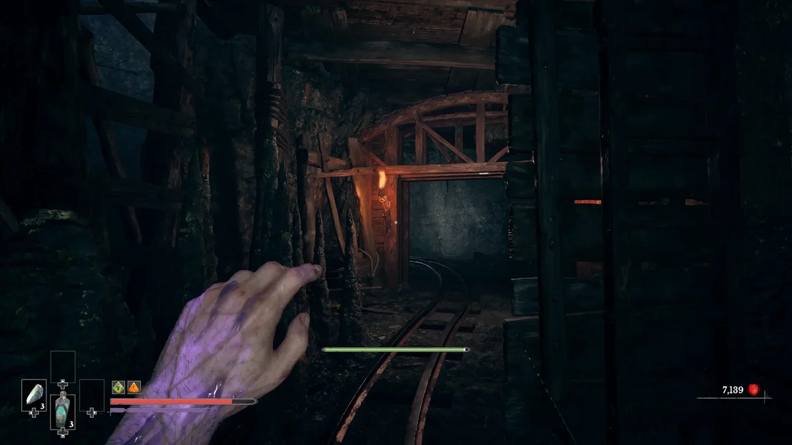 Go through the tunnel behind the ladder.