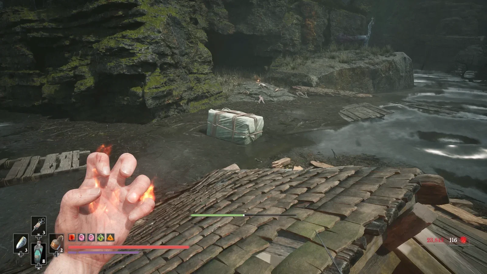 Jump across the floating debris then go right.