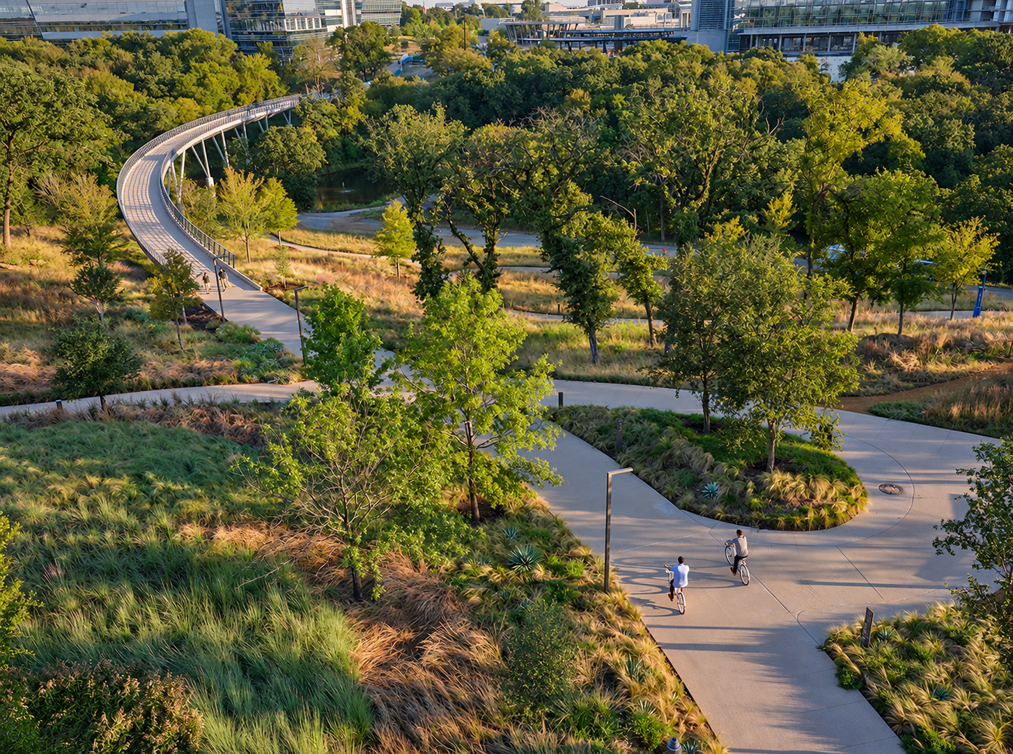 Paths weave through the planted campus landscape.