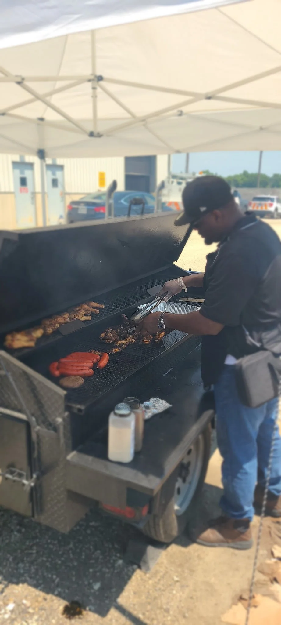 Mercedes Brown working the pit smoker