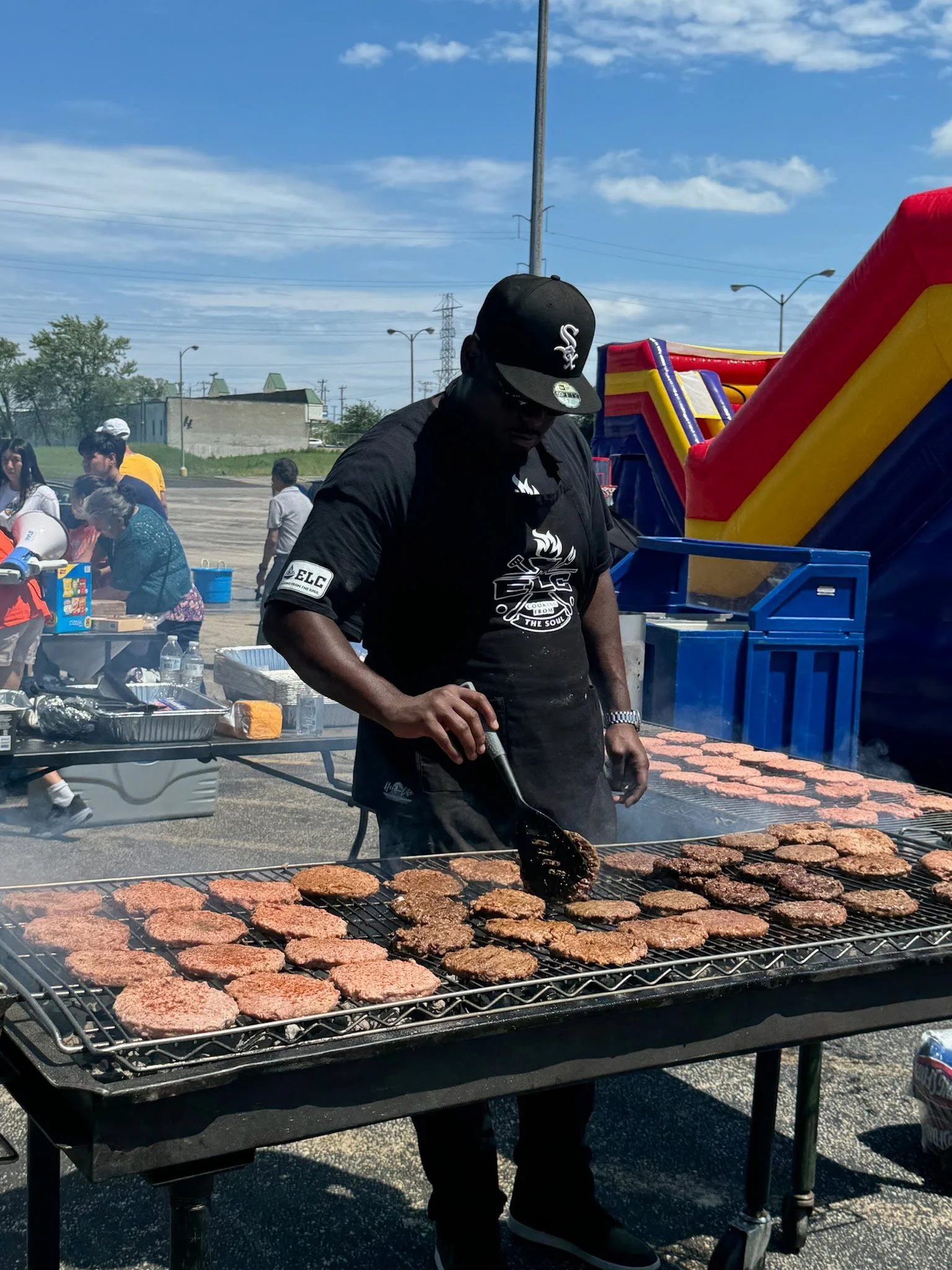 Mercedes grilling at a community event