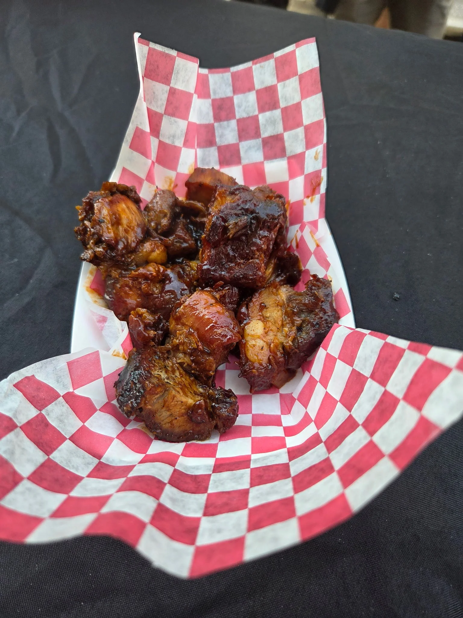 Rib tips on red checker paper