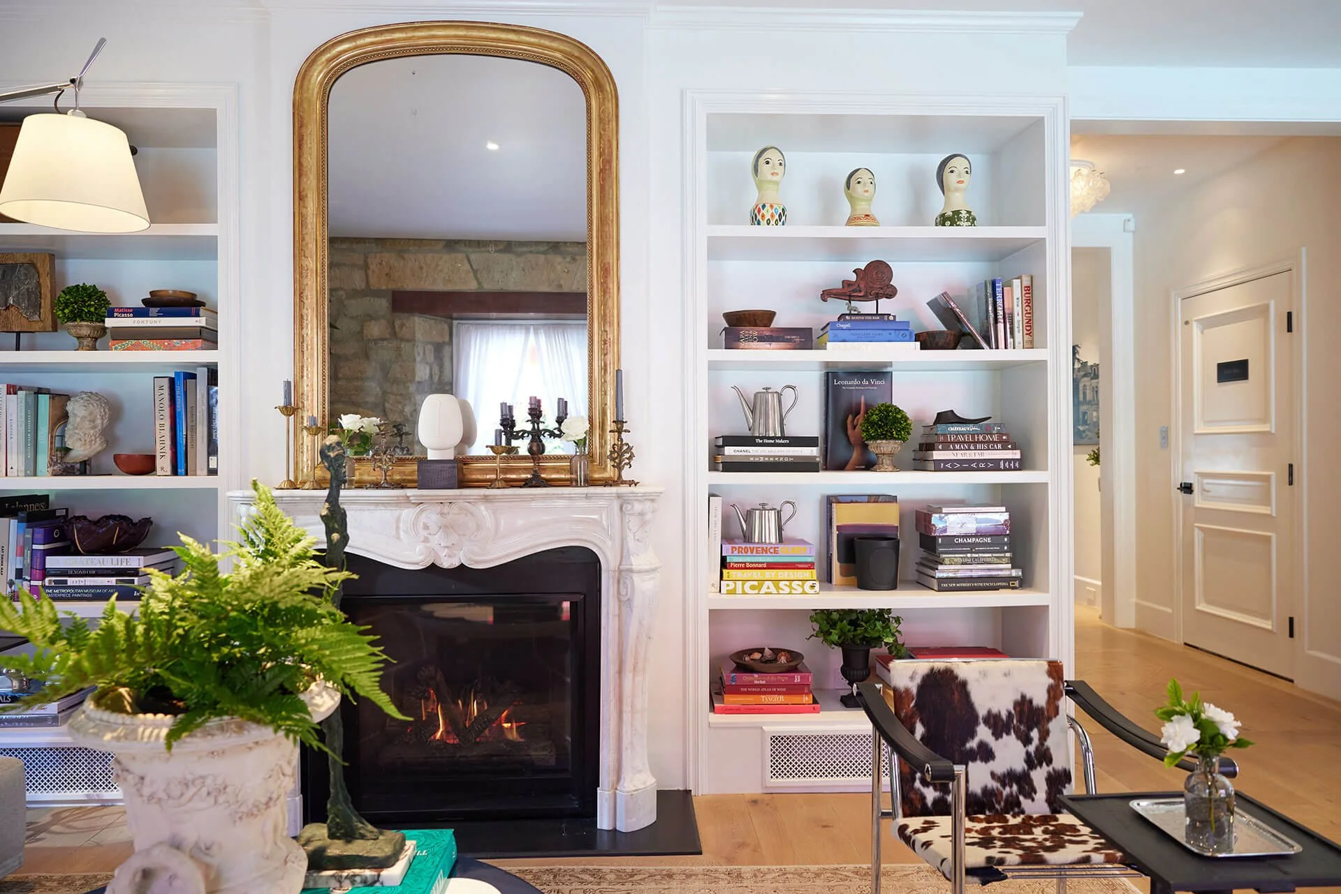 Interior · stone wall, fireplace, bookshelves