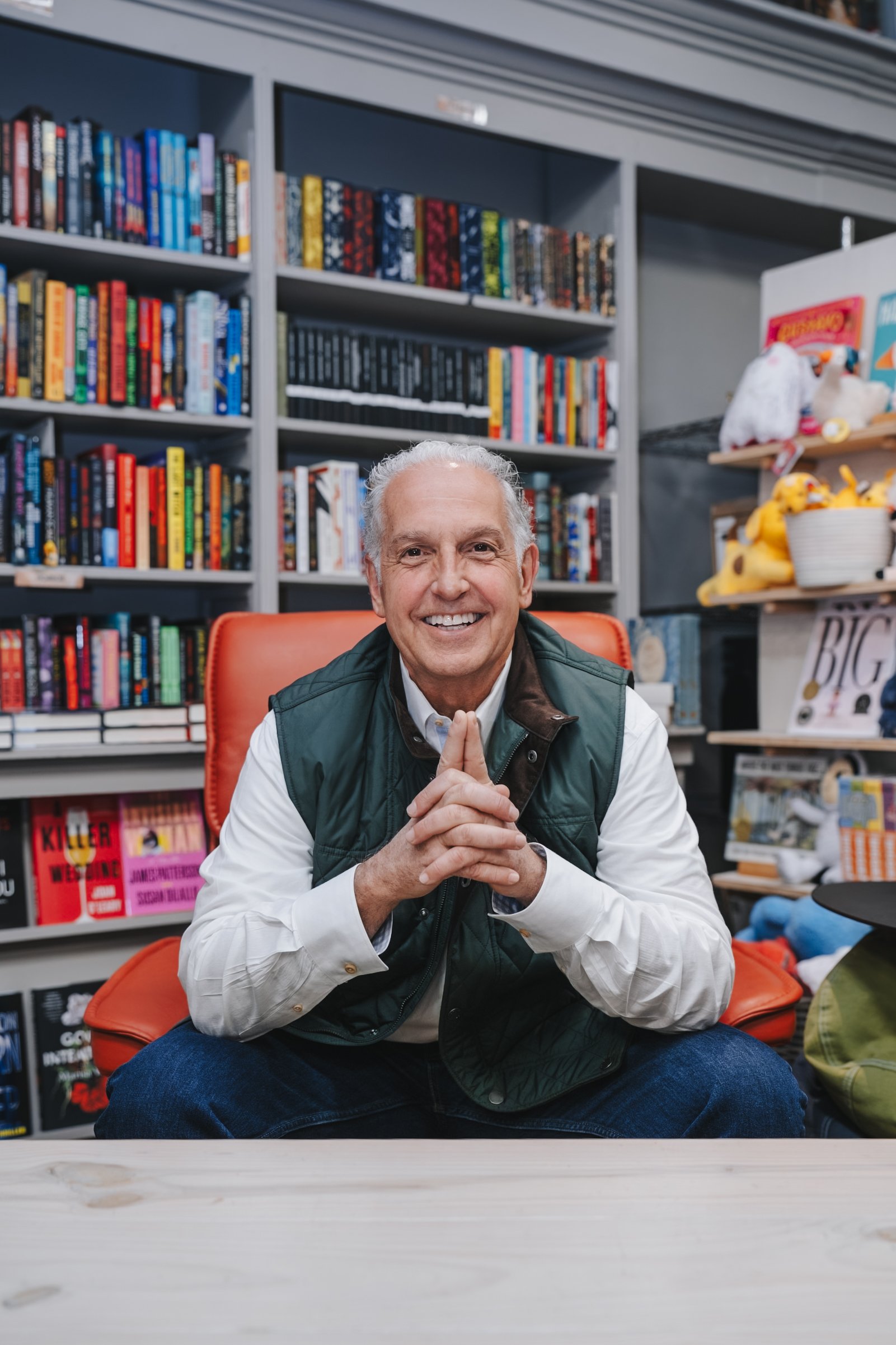 Tom Grabowski smiling in a warm editorial portrait