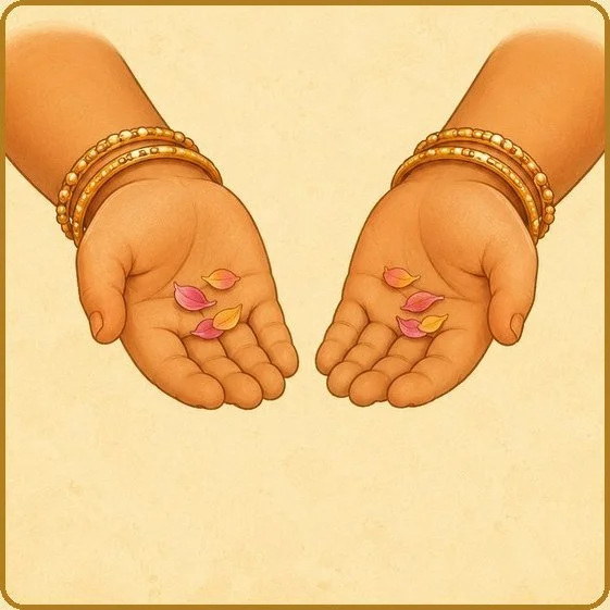 Two small hands held open, with petals resting in the palms
