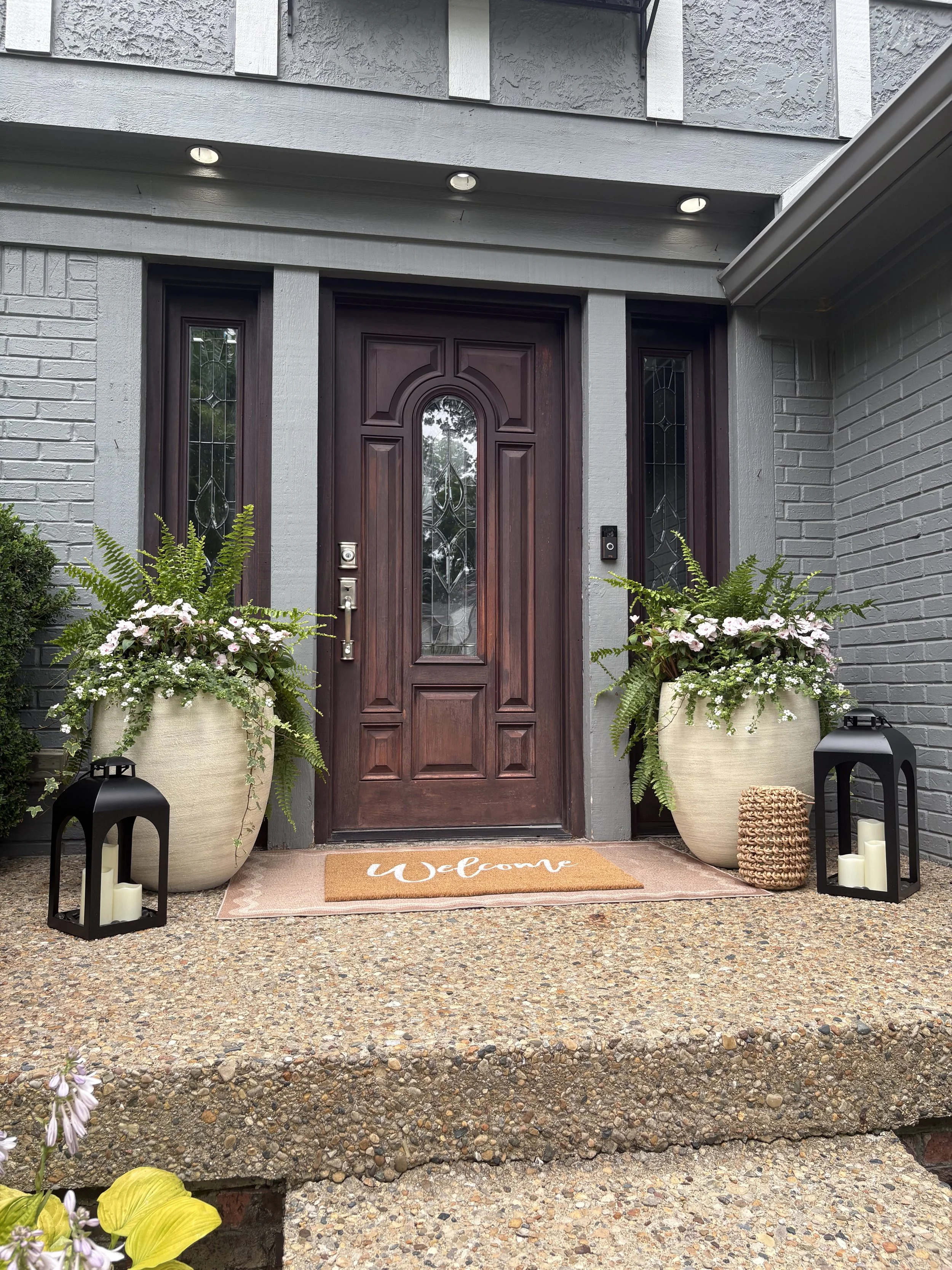 Professionally styled seasonal front porch and entrance