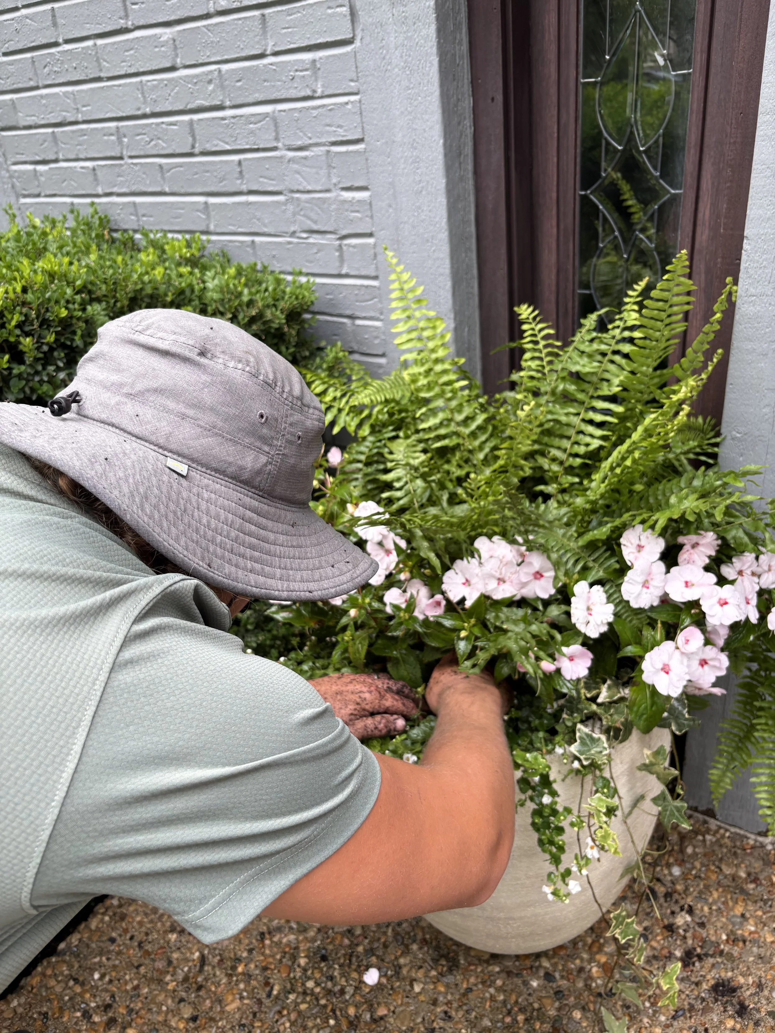 Behind-the-scenes outdoor styling installation by Curated Entry Co.