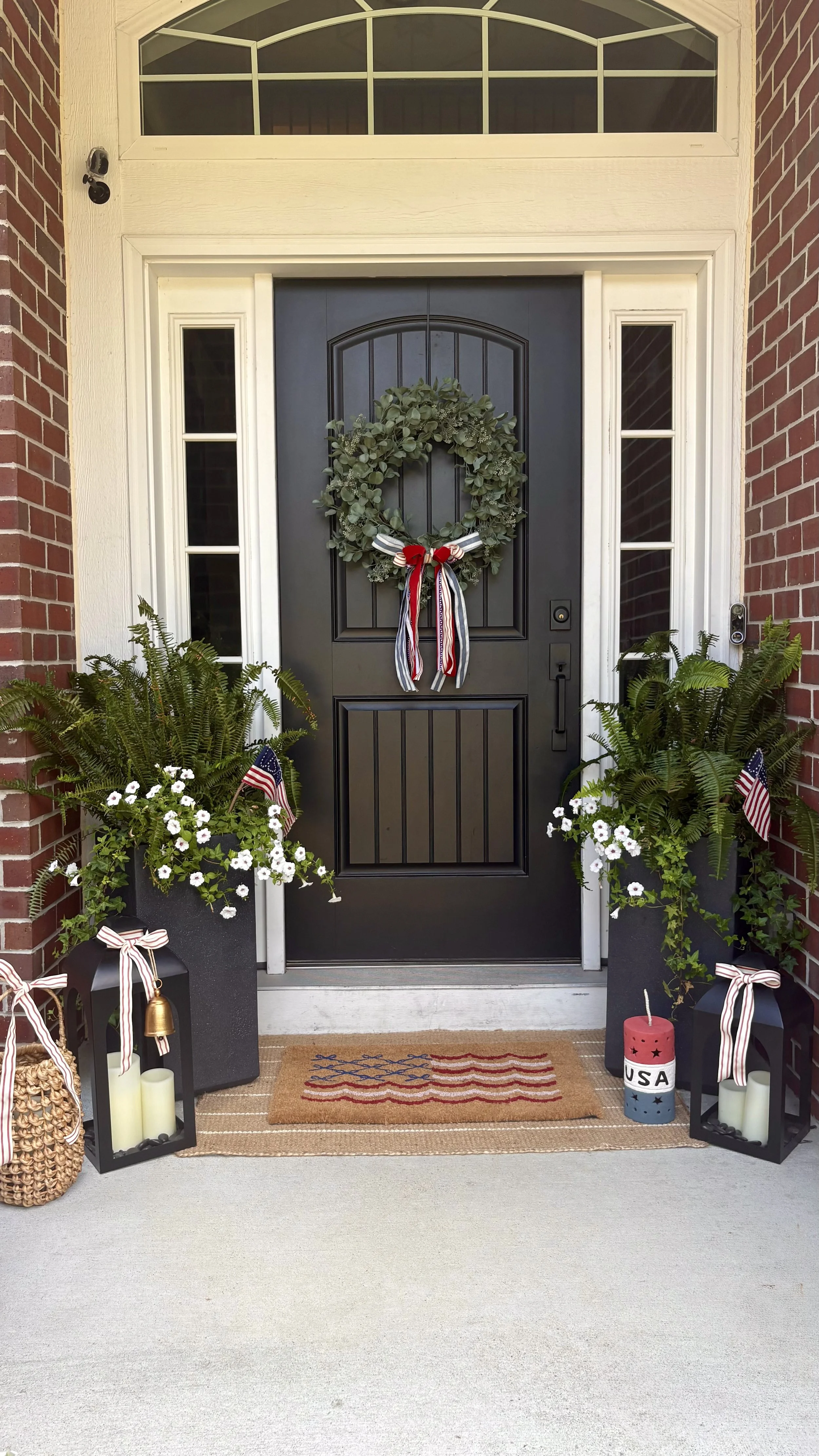 Professionally styled seasonal porch by Curated Entry Co.