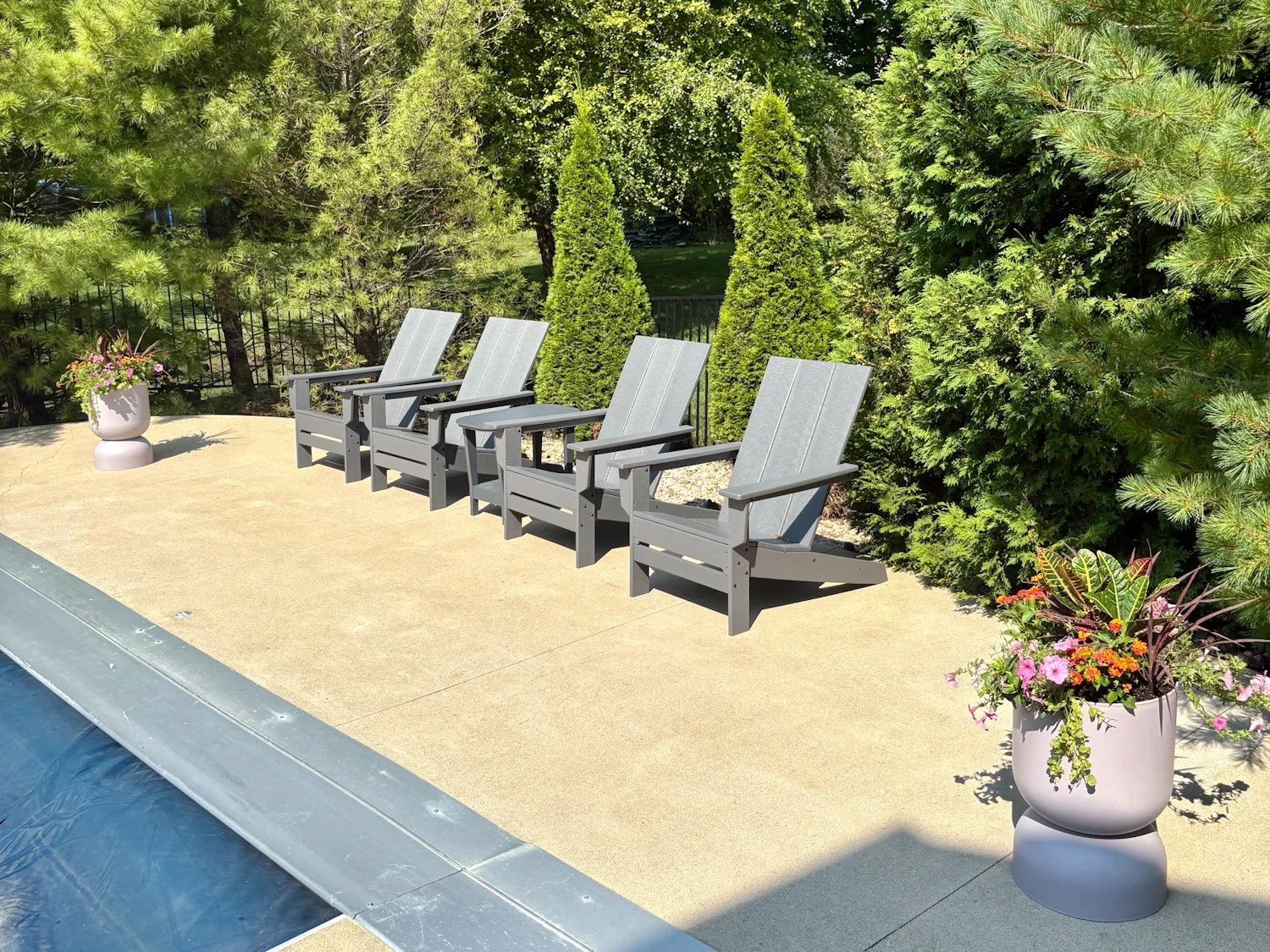 Seasonal flowers and foliage professionally arranged in an outdoor planter
