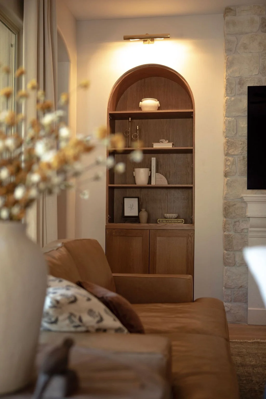 Full living room showing multiple seating areas and flow