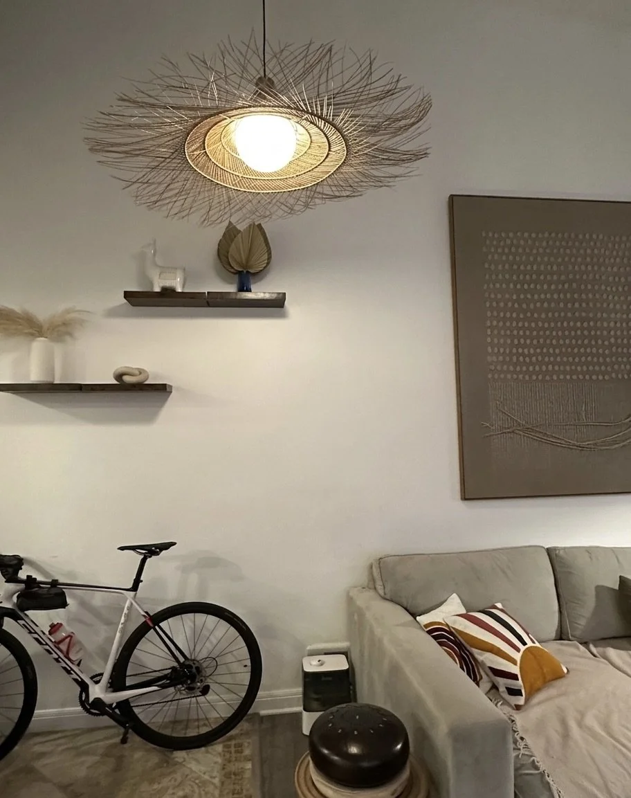 Oversized woven rattan pendant lighting over the breakfast bar