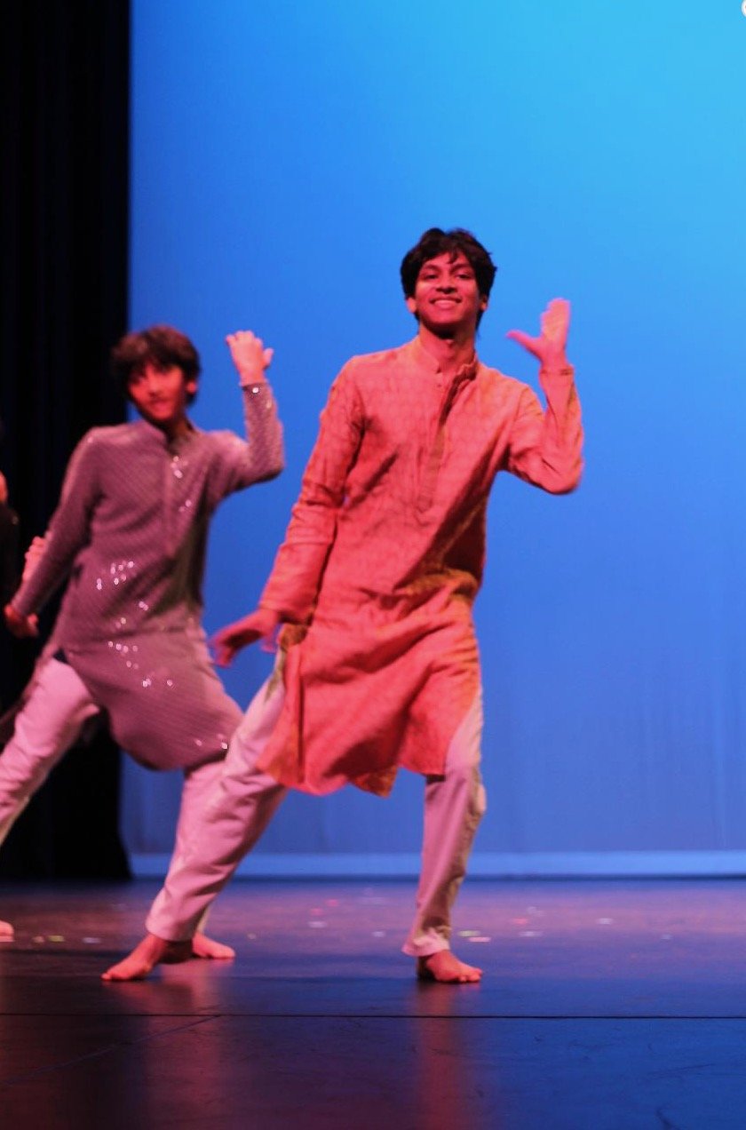 Arnav performing cultural Indian dance at SOOS 2025