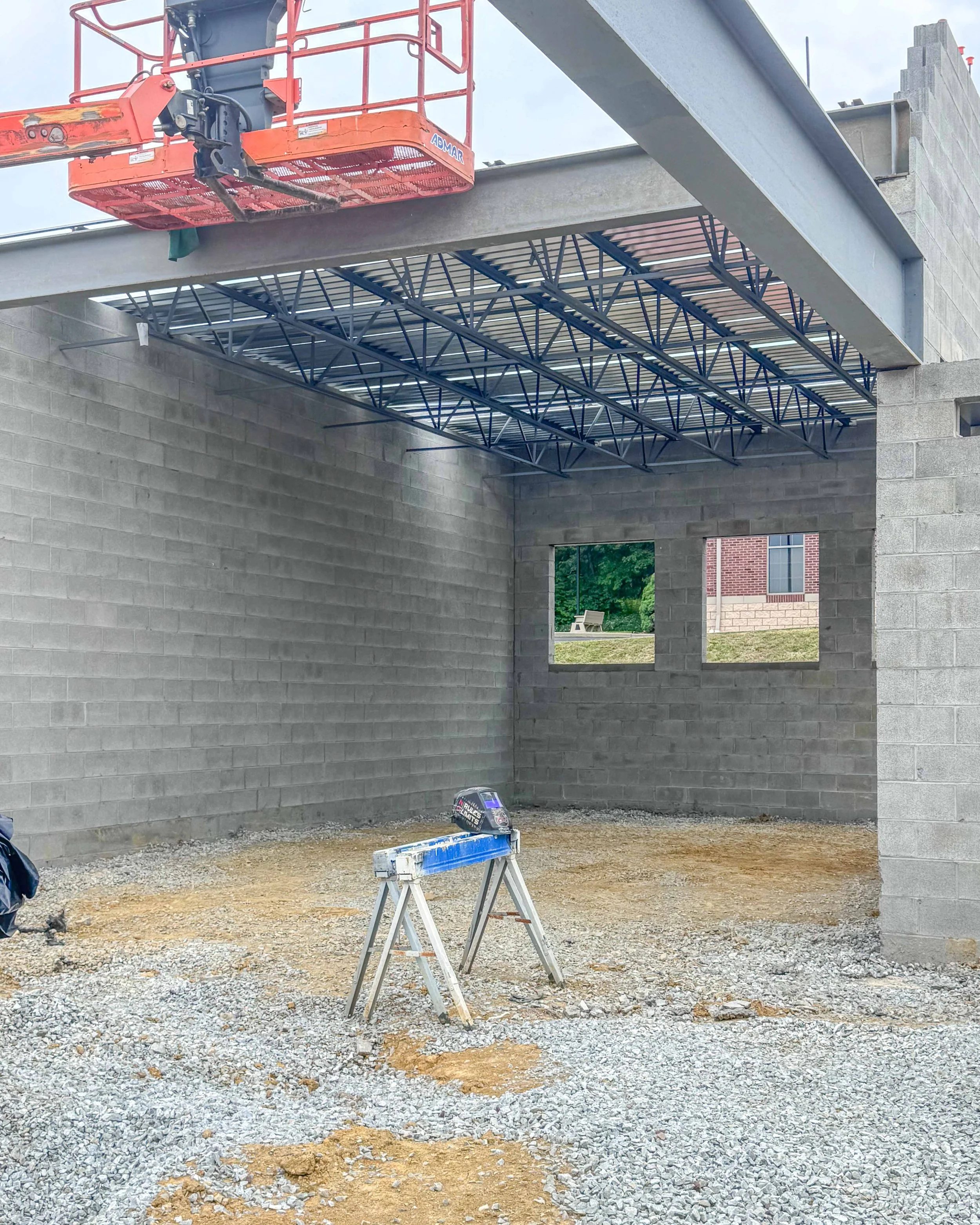 Interior steel roof framing and concrete block walls during construction of Common Ground Kitchen & Taps in McMurray, PA.