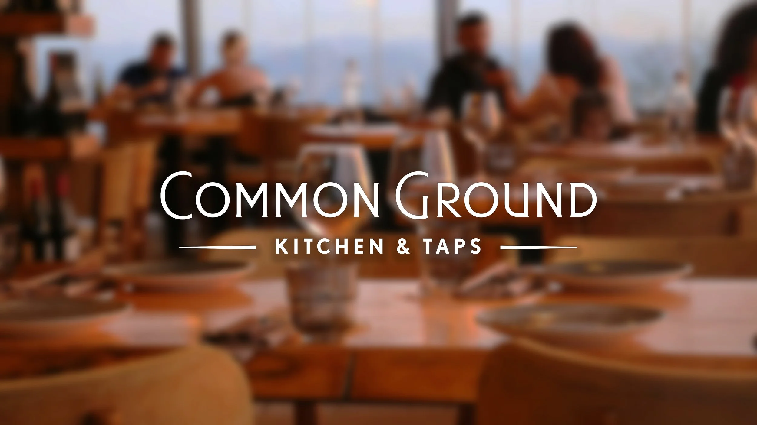Common Ground Kitchen and Taps logo over a warm, candlelit dining scene with guests gathered at wood tables in McMurray, PA