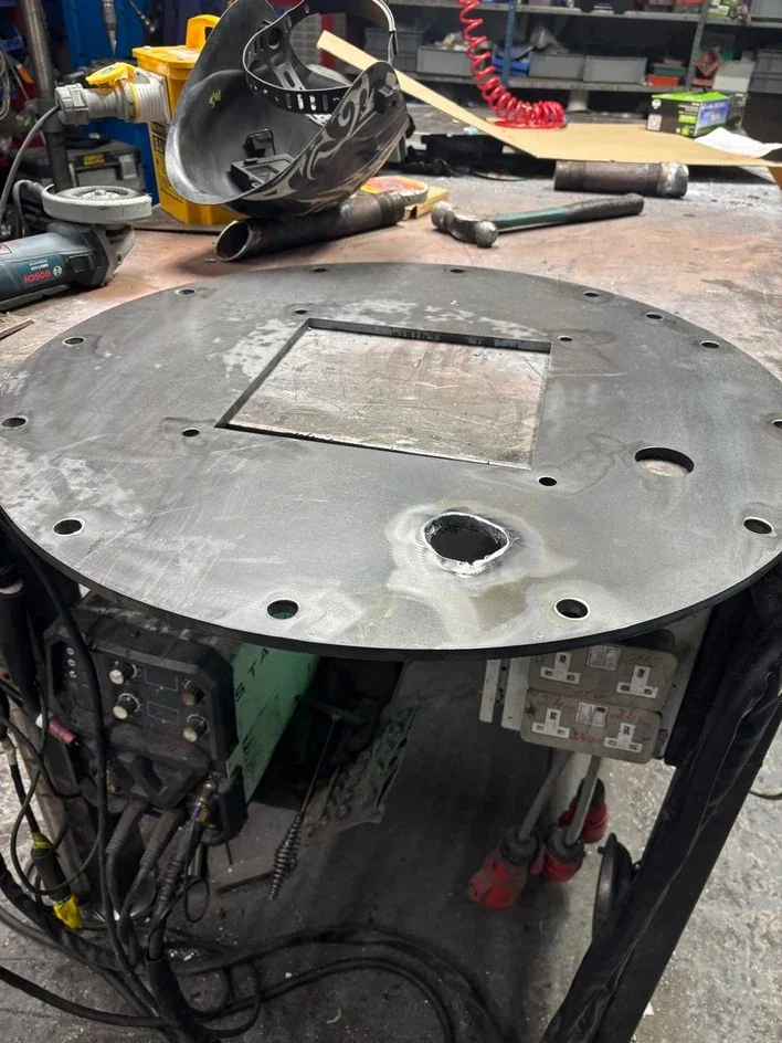 Replacement burner faceplate during fabrication.