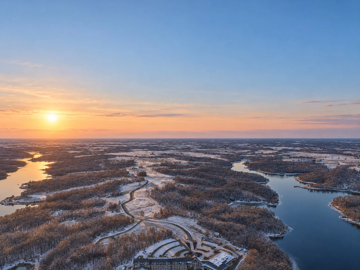 Winter sunset over Honey Creek Resort and Rathbun Lake.
