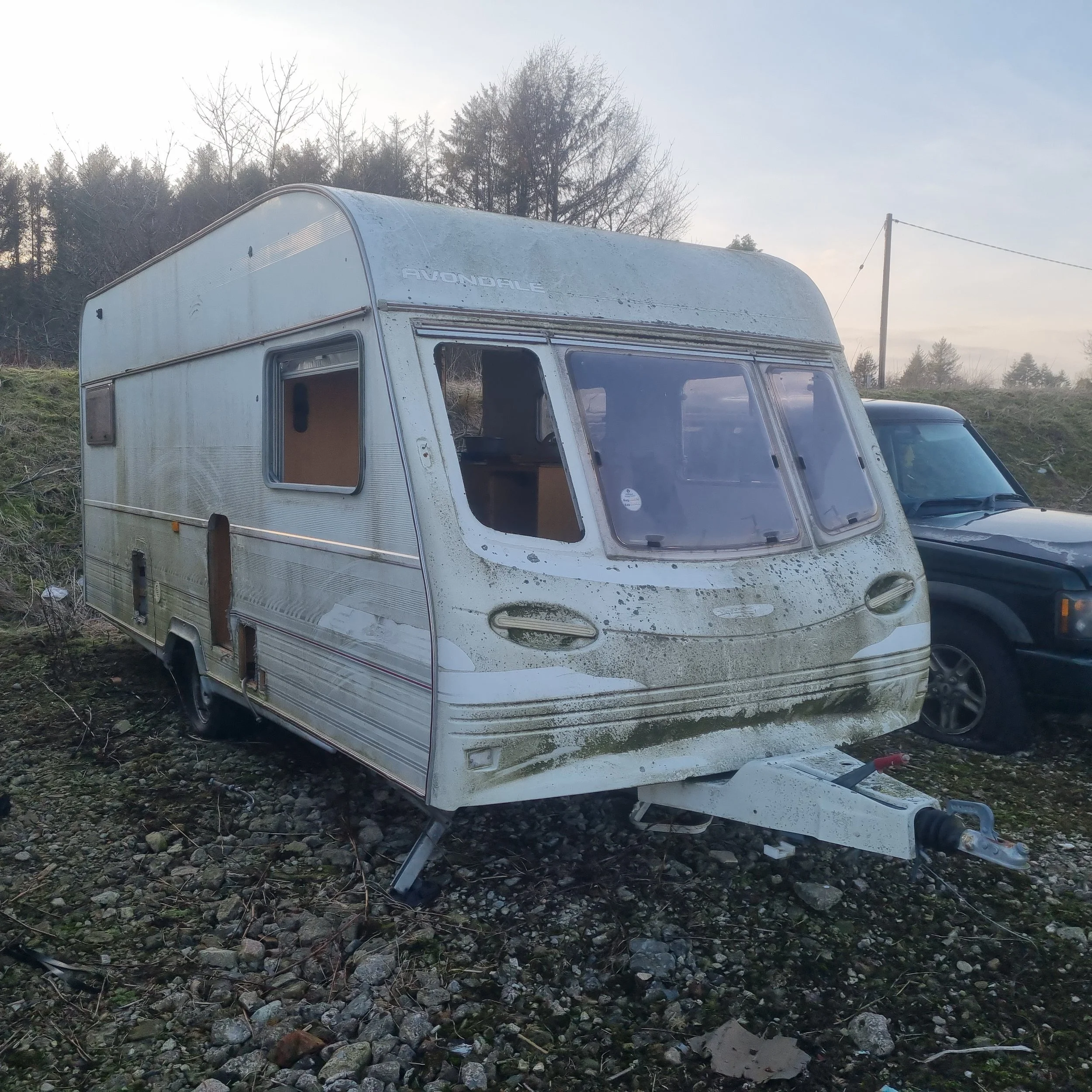 Scrap Avondale caravan being processed for specialist salvage and recycling