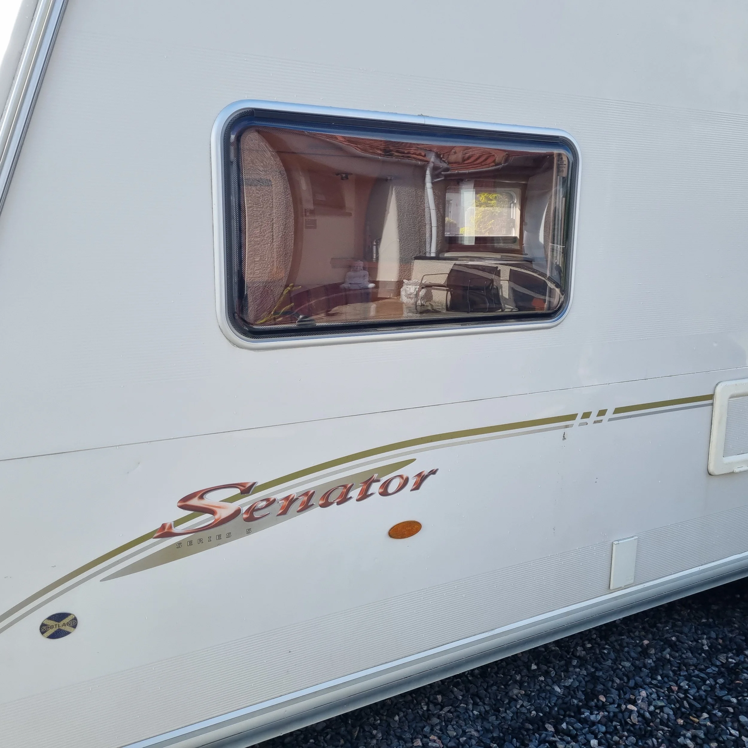 Completed window replacement on the Bailey Senator Carolina caravan