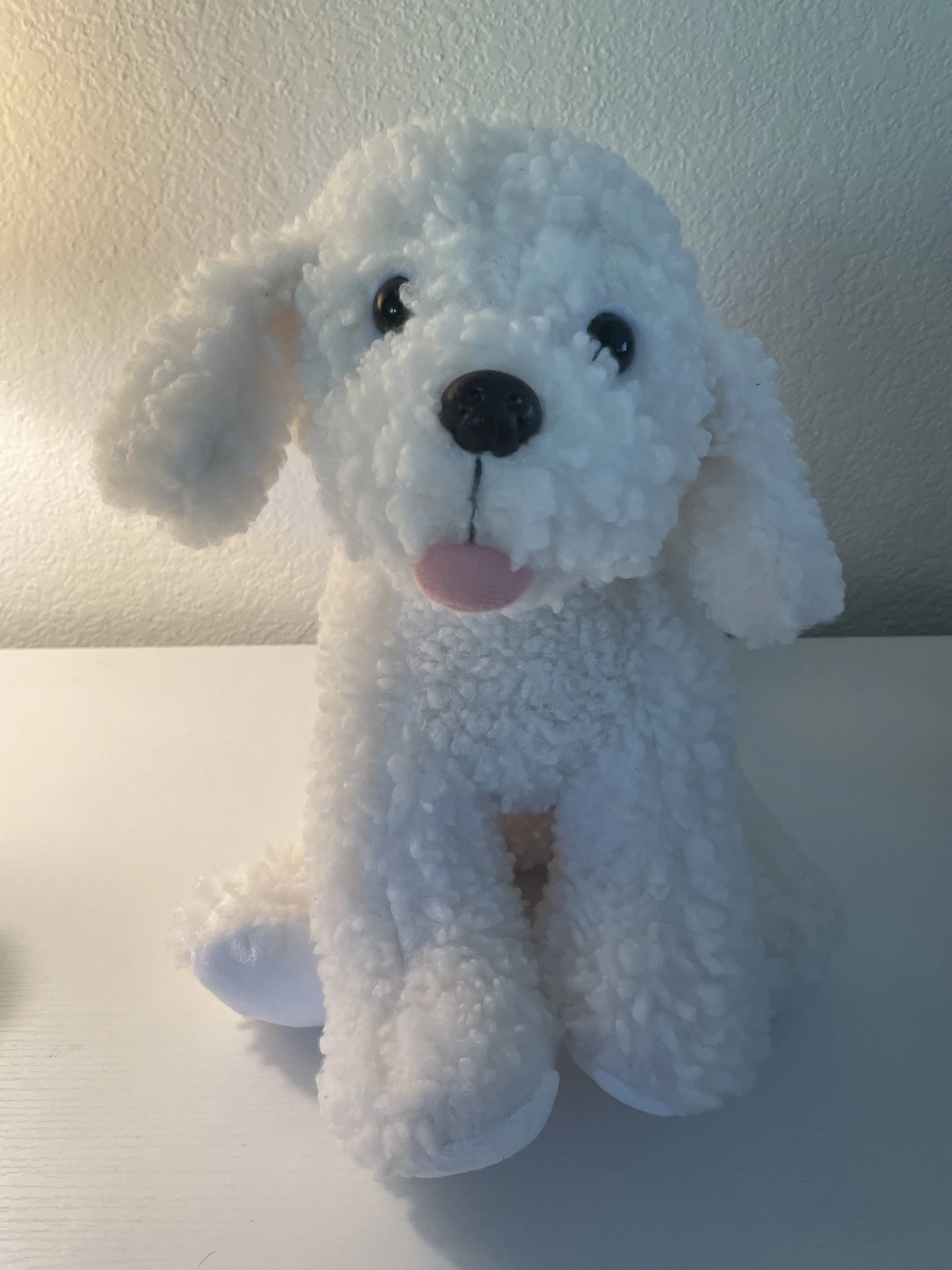 Noodle stuffed dog