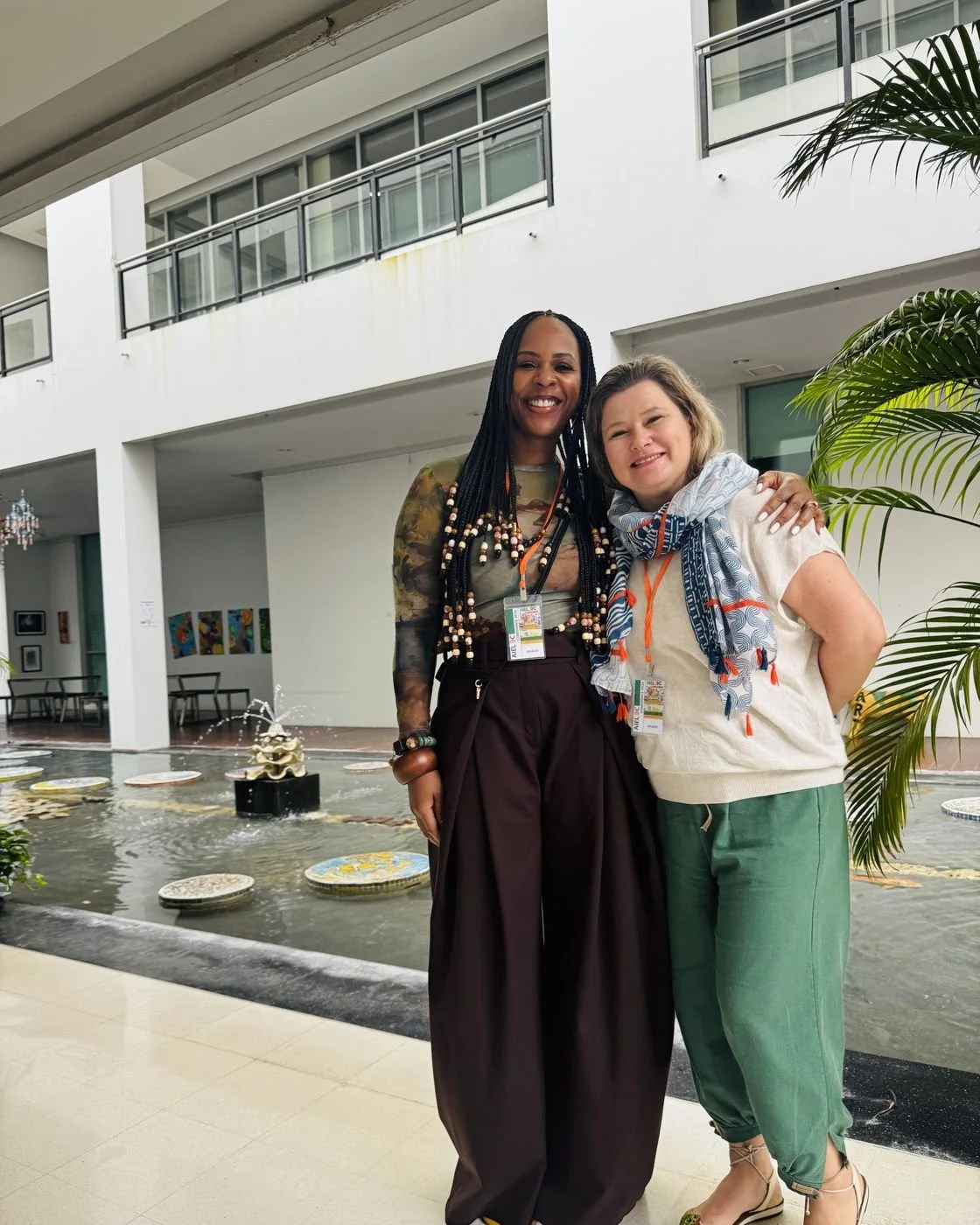 Nicole Bonnah and Janice Stewart-Yates, both wearing speaker badges, at AIELOC 2026