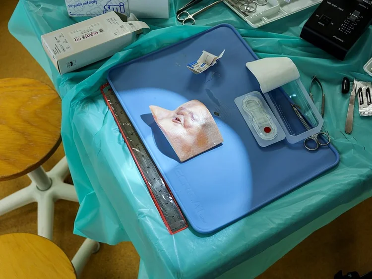 Eyelid training model on a wetlab mat