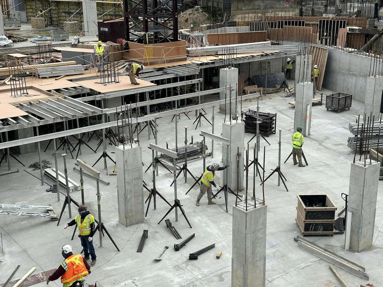 Construction crews coordinating concrete formwork in Bethesda, Maryland