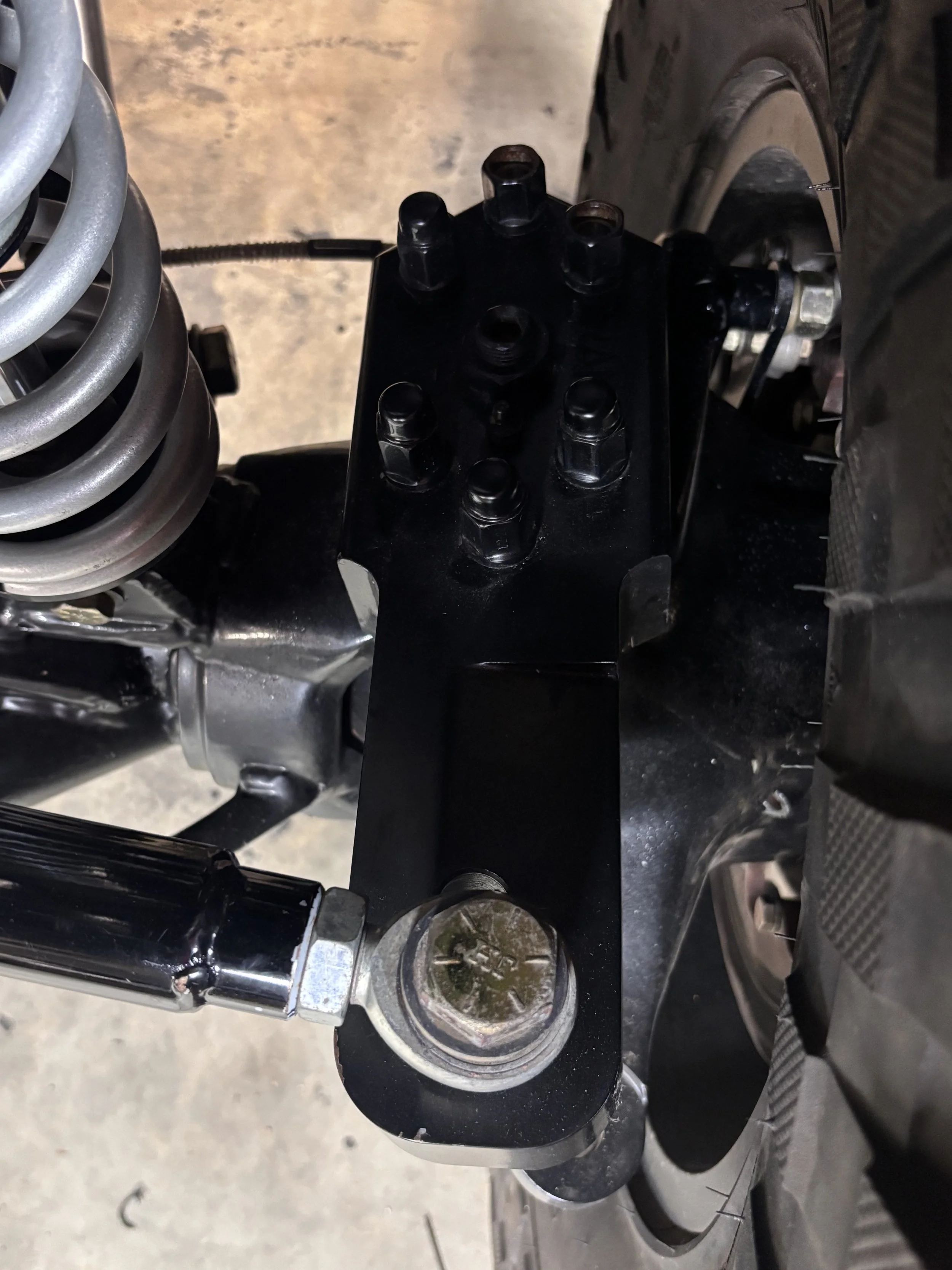 Extended high-steer arm left view