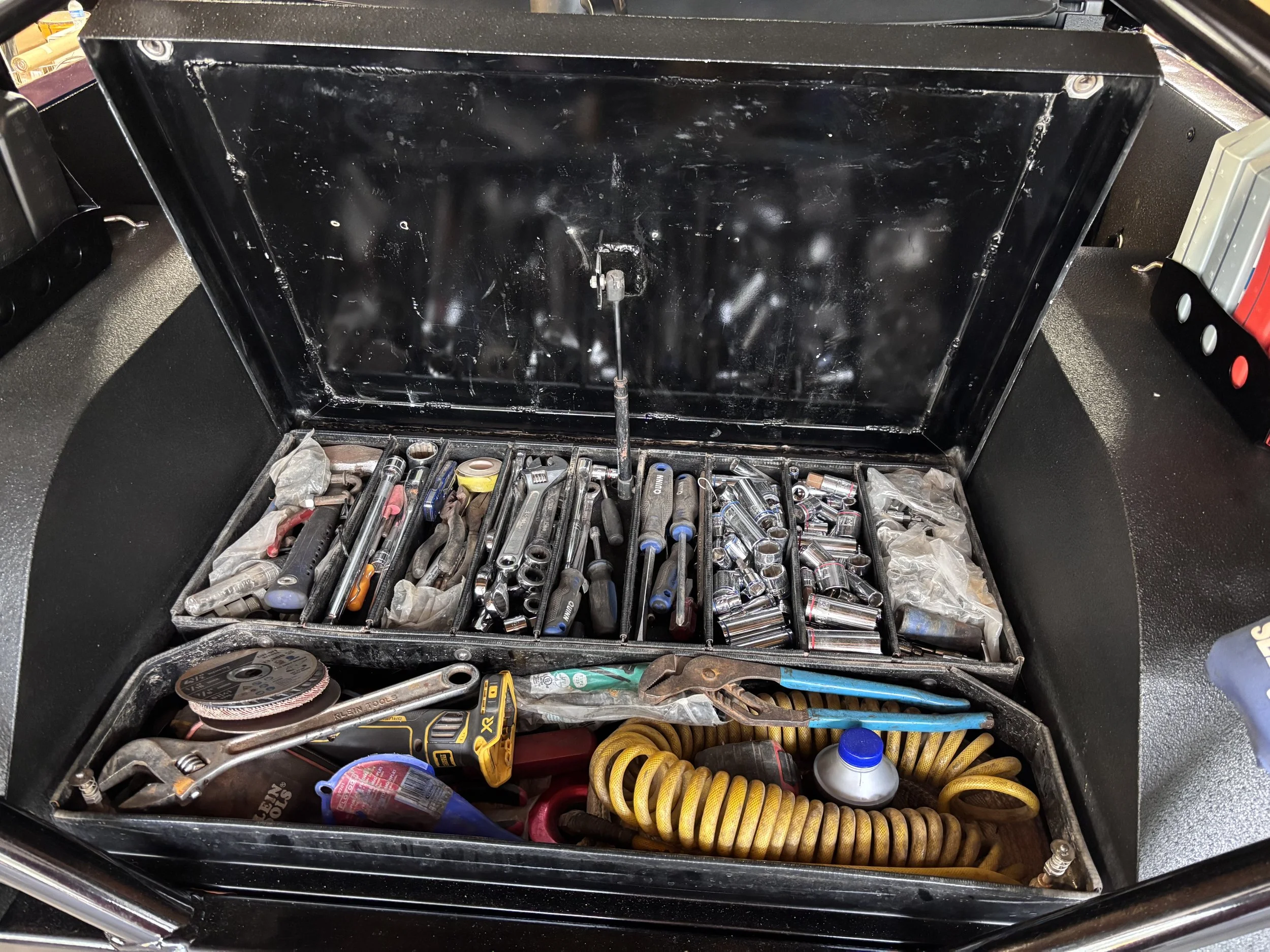 Integrated rear toolbox left view
