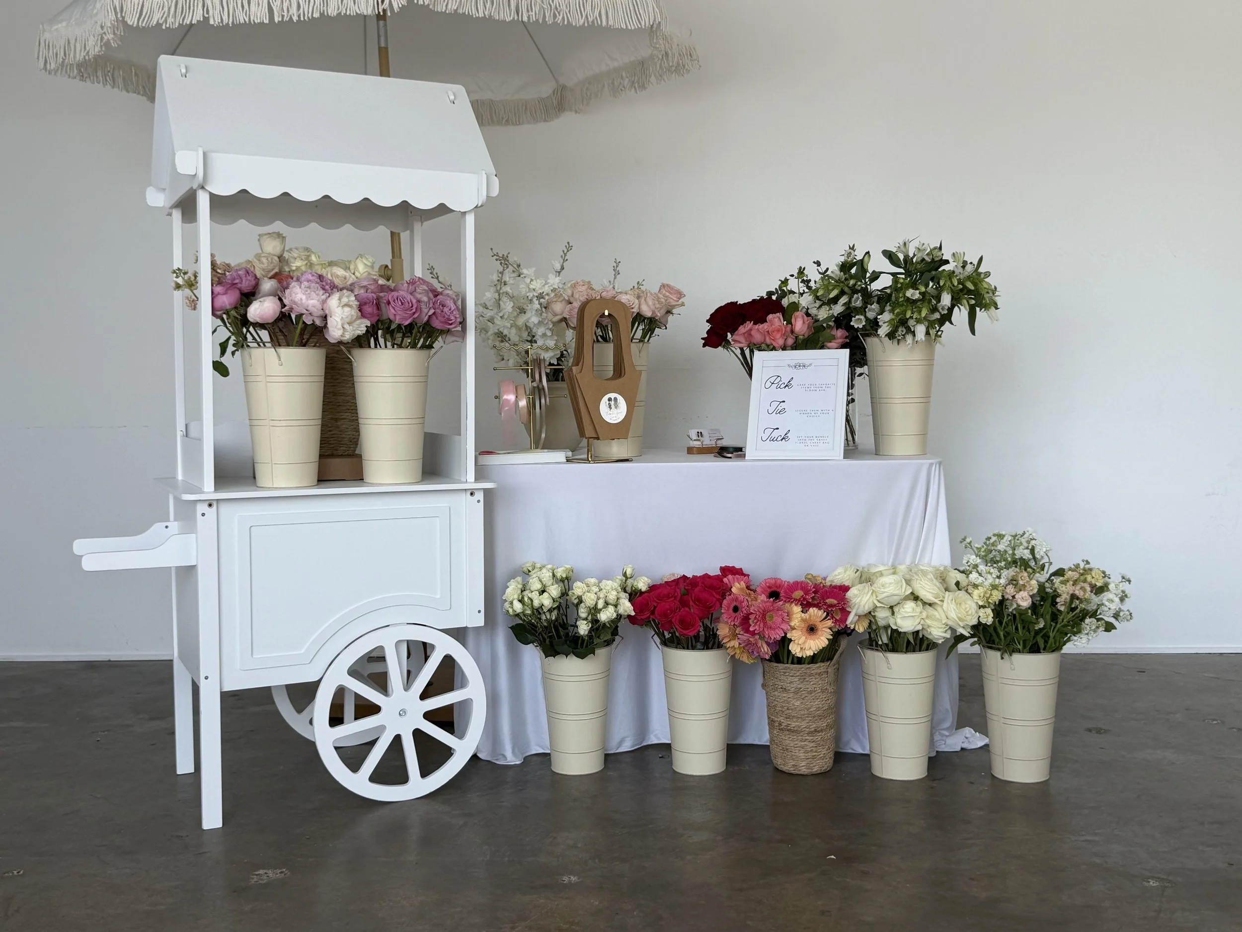 The Crafted Line styled bloom bar flower cart with fresh blooms