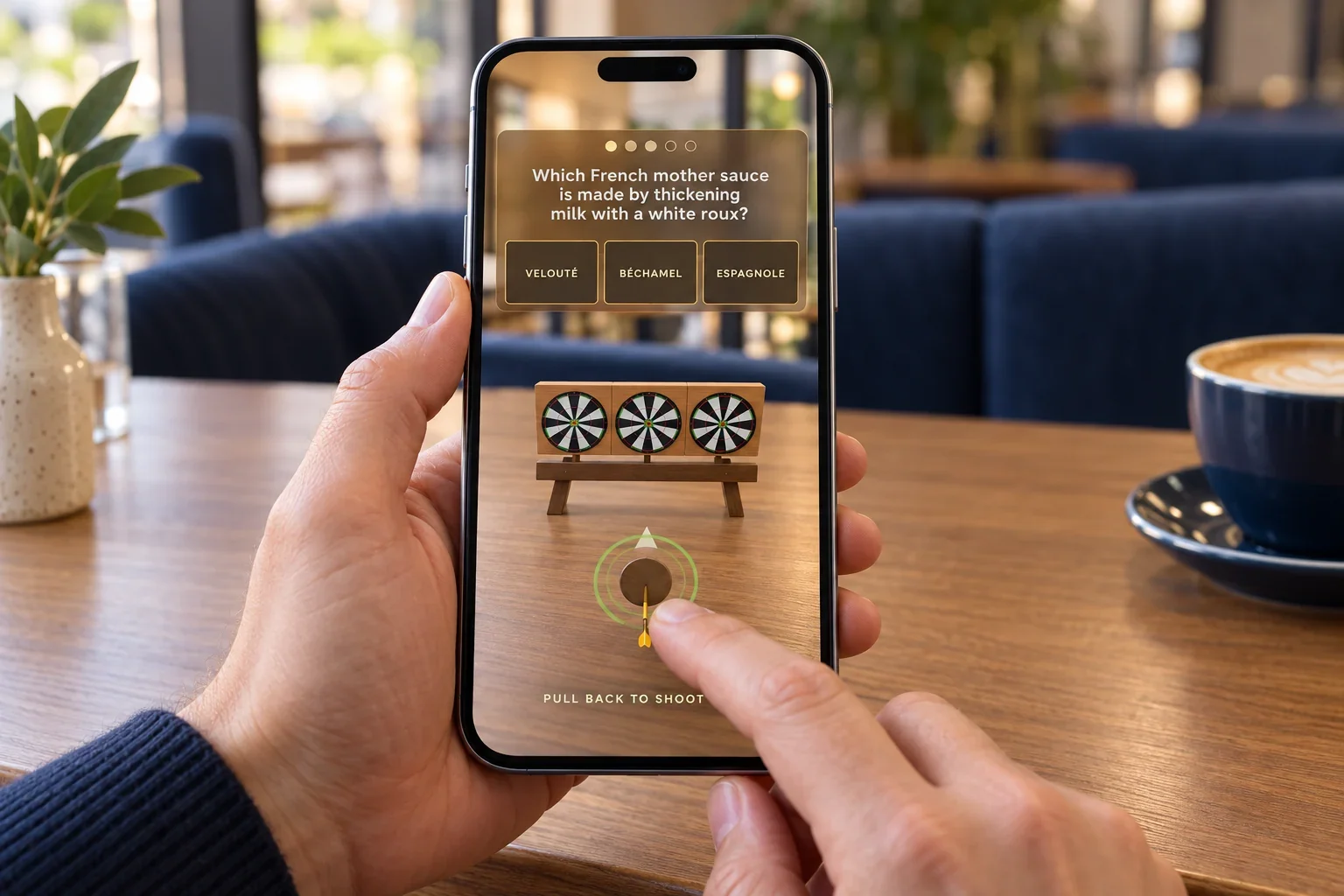 Illustration of a participant holding a phone with the Darts AR experience appearing over a table
