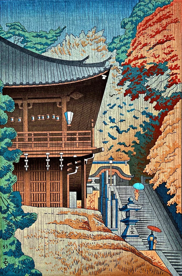 Canvas reprint of Autumn in Nigatsudo Temple by Takeji Asano: a dark wooden temple hall projects beside stone steps, red and pale autumn trees, small figures and colourful umbrellas beneath fine rain.
