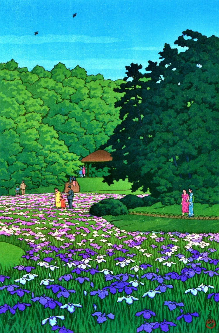 White and violet irises fill a garden at Meiji Shrine, with visitors, green trees and a pavilion beneath a blue sky.