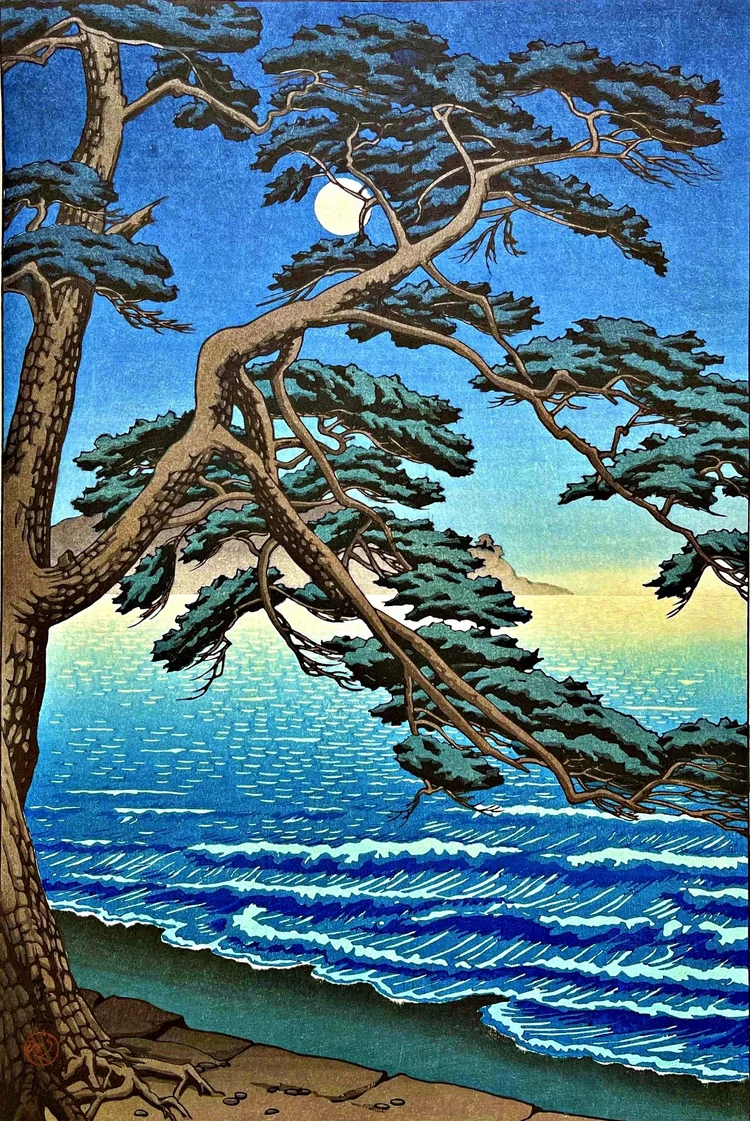 Canvas reprint of Moon at Enoshima Beach by Ishiwata Kōitsu (Tōkō): a pale full moon seen through sweeping coastal pine branches, blue-green sea with white surf, a warm yellow horizon, and roots beside a sandy shore.