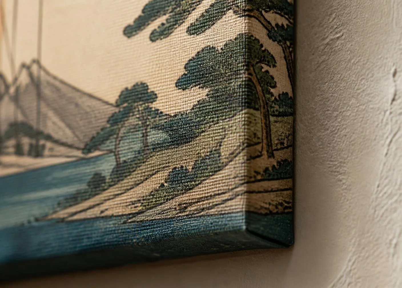 Close-up illustration of canvas texture and a wrapped edge beside a wall