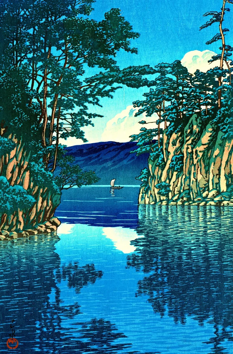 Lake Towada by Kawase Hasui: pine-covered cliffs and blue mountains reflected in vivid blue water, with a small white-sailed boat.