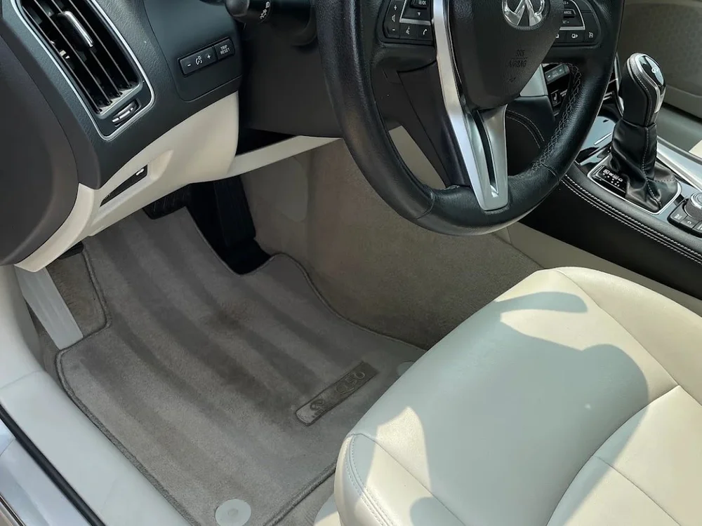 Silver Infiniti interior finish after Loudoun Mobile Autopflege detailing.