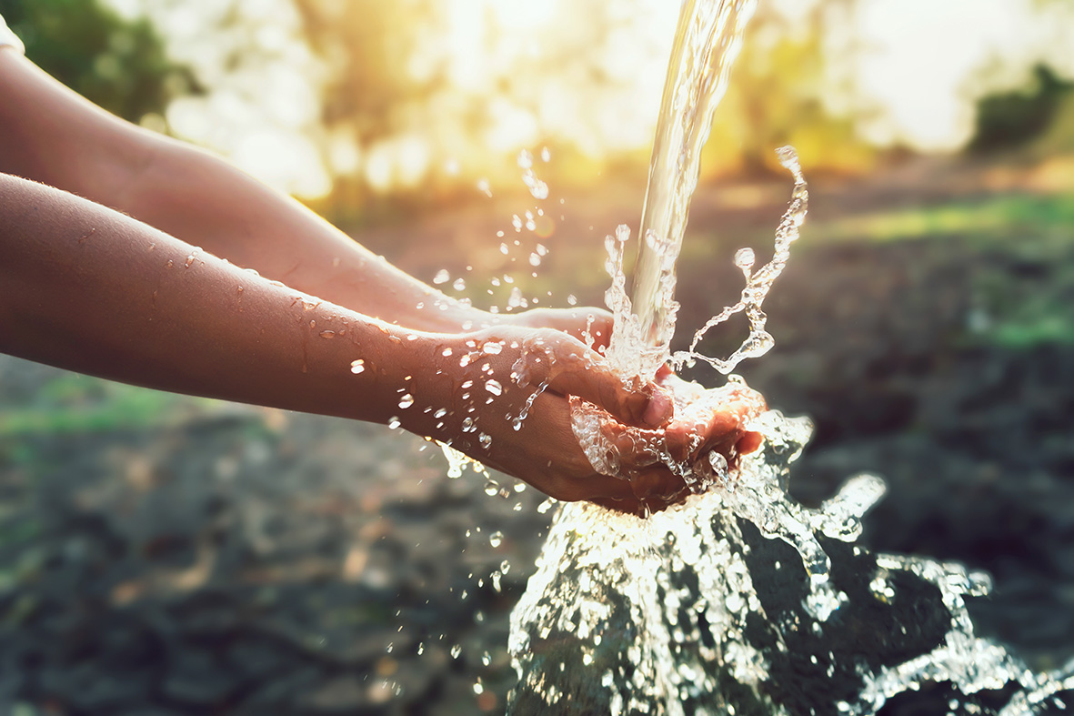 Fresh water running over hands