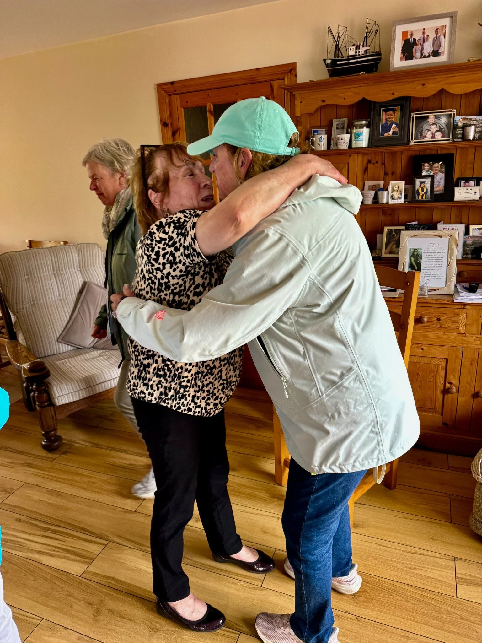 A family embrace during Debi and Denise’s visit