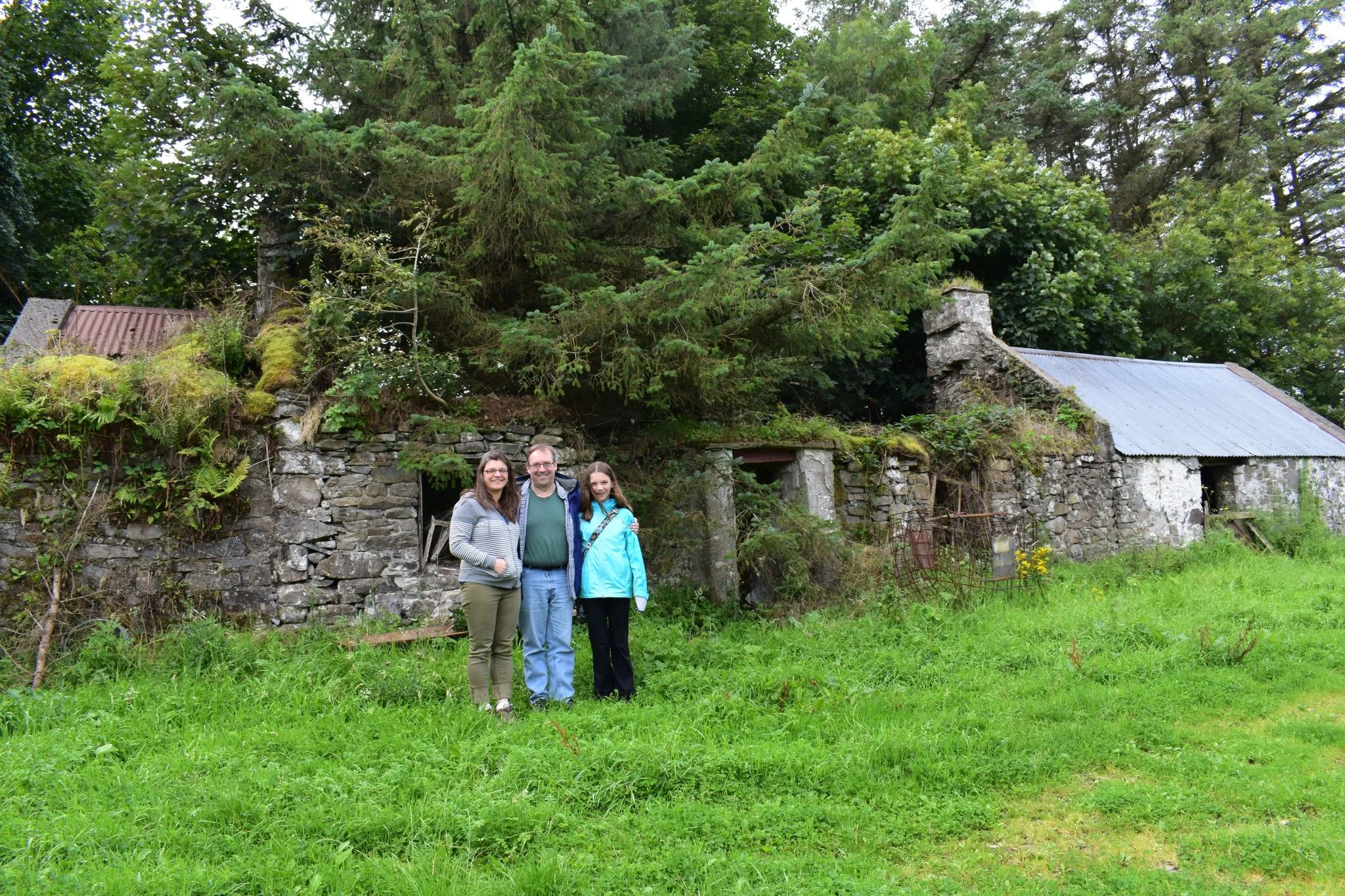 Jim Bradley and family outside an ancestral home