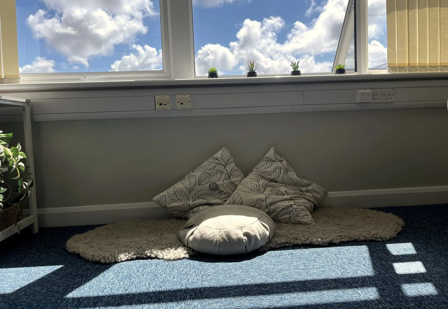 Floor cushions in the sunshine in Angela’s counselling room