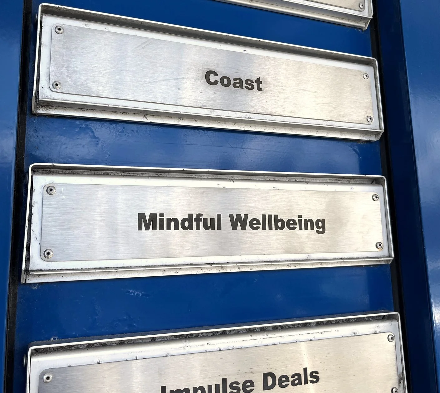 Mindful Wellbeing nameplate at the entrance