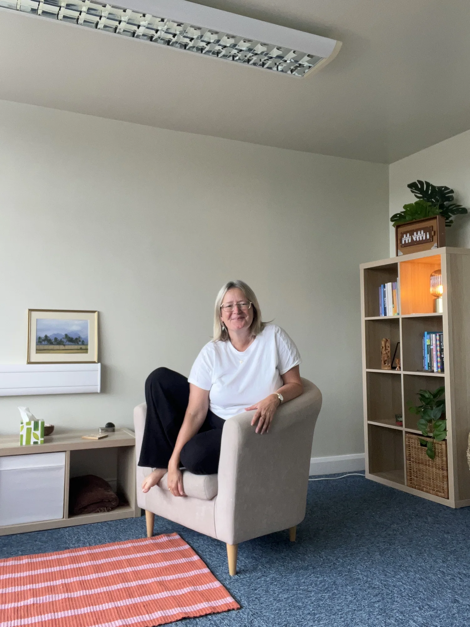 Angela Ross, neurodivergent counsellor, relaxing in her counselling room in Bispham, Blackpool